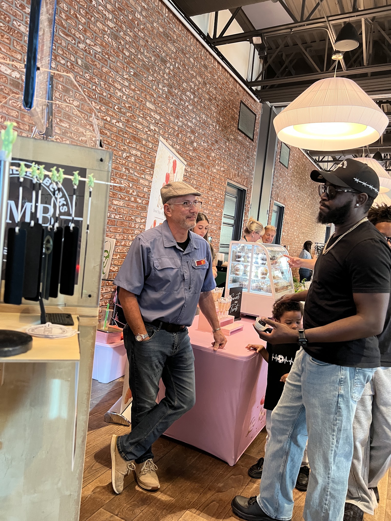 Glenn Miller talking with a visitor at the Dockside event